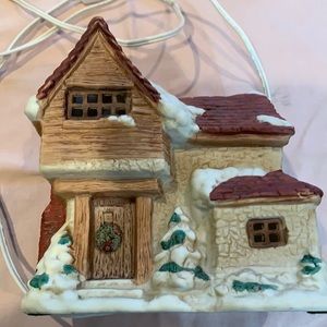 Dickensville porcelain lighted house.